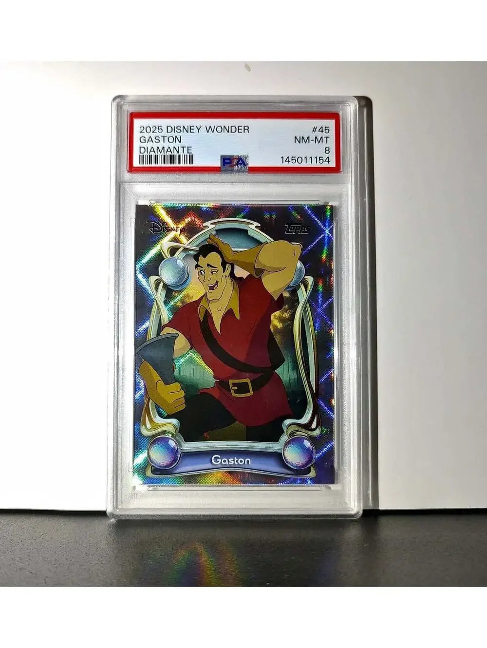 Gaston 2025 Topps Disney #45 Winter Variant Card Beauty and the Beast PSA 8